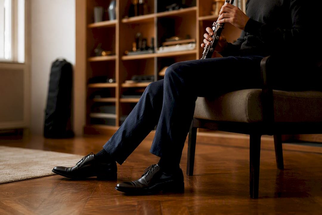 Bass Clarinet Posture Support Tips That Fix Tone Fast Player’s seated posture and foot placement side view